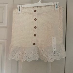 Whitish cream tube top
